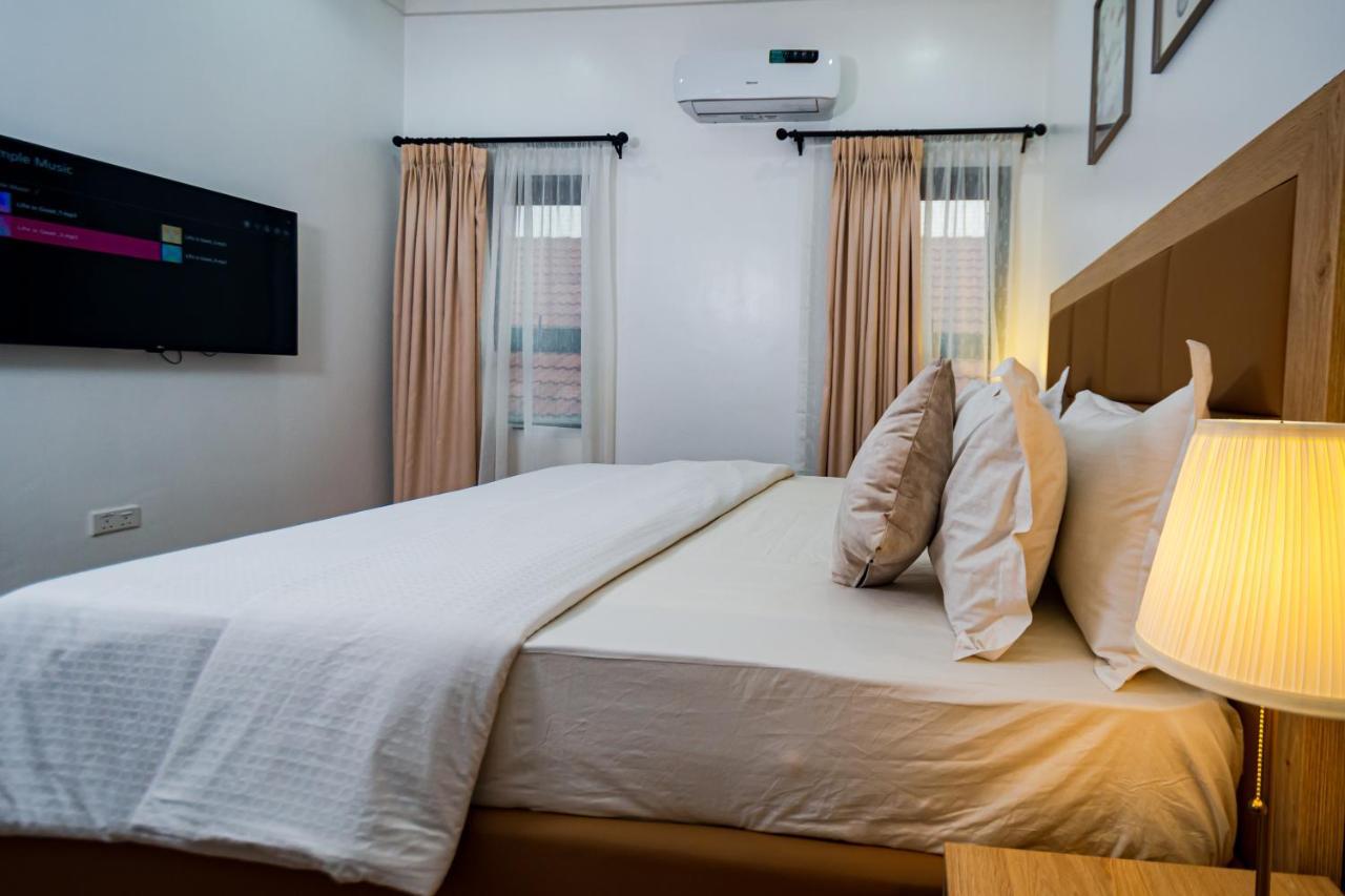 Quest Boutique Hotel Gwarinpa Bagian luar foto